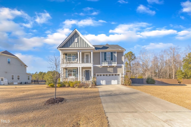 craftsman house with a garage