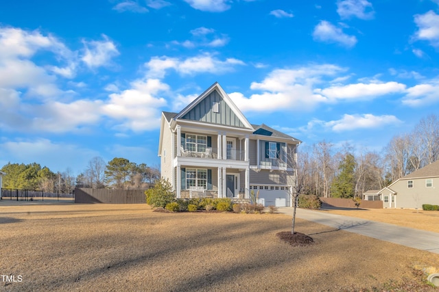 view of front of home with a garage and covered porch