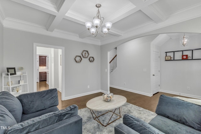 living room featuring coffered ceiling, an inviting chandelier, ornamental molding, dark hardwood / wood-style floors, and beamed ceiling