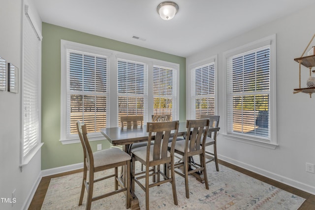 dining room featuring dark hardwood / wood-style floors