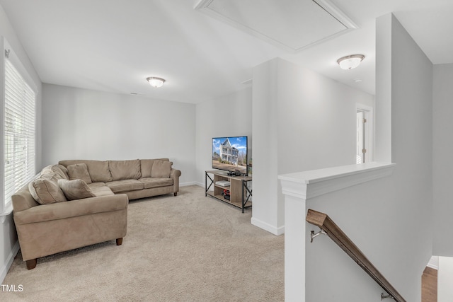 living room featuring light colored carpet