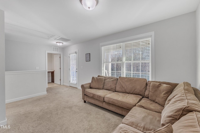 living room with light colored carpet