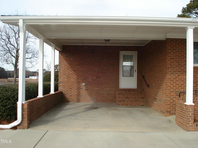 view of patio / terrace featuring a carport