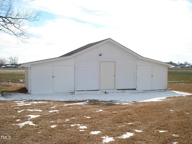 view of snow covered garage