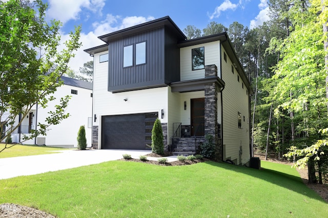 modern home with a garage and a front yard