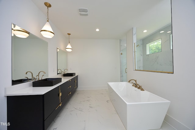 bathroom featuring independent shower and bath and vanity