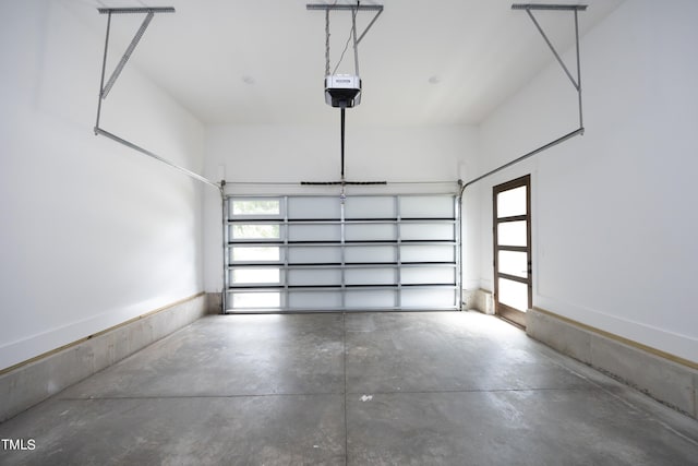 garage featuring a garage door opener