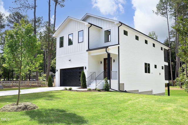 modern farmhouse style home with a garage and a front yard