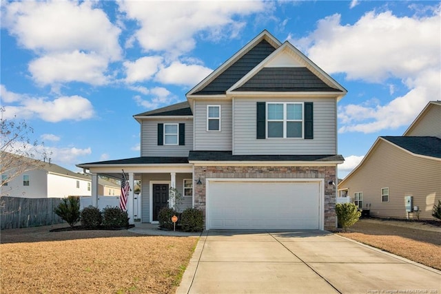 view of front of property with a garage