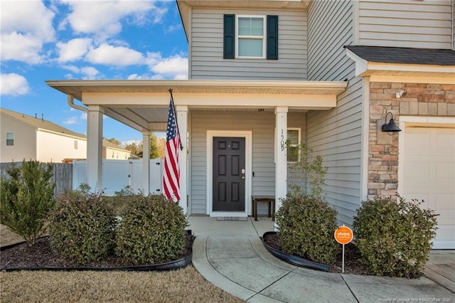 doorway to property featuring a porch