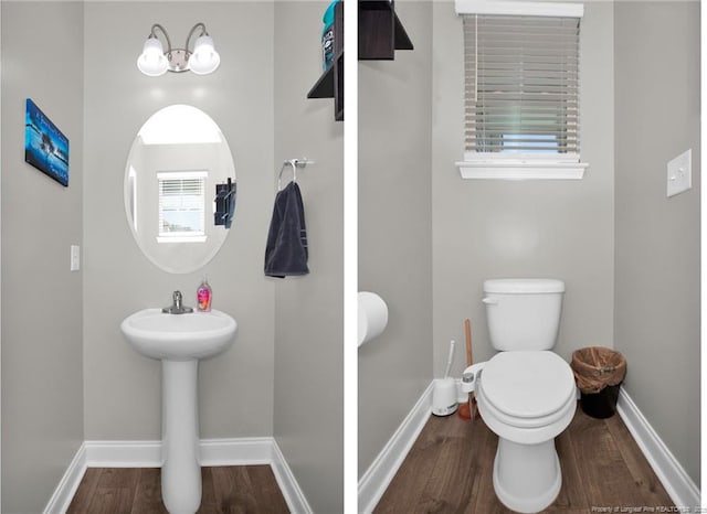 bathroom with wood-type flooring, a notable chandelier, and toilet