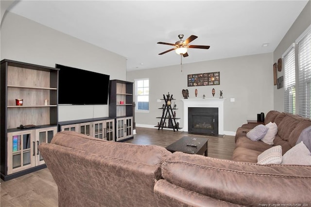 living room with hardwood / wood-style flooring and ceiling fan