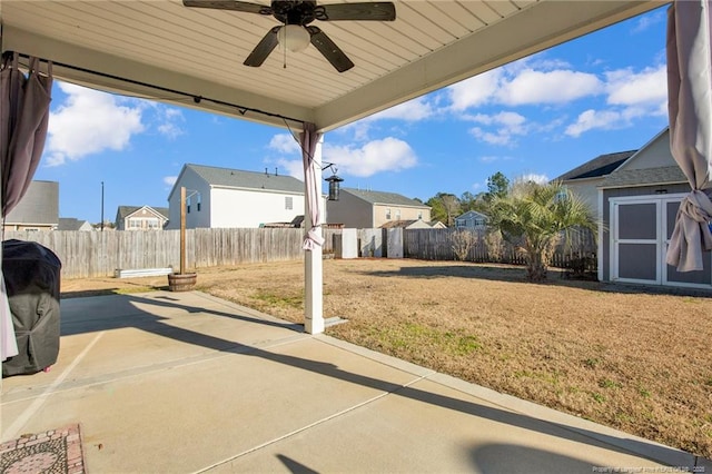 view of patio featuring ceiling fan