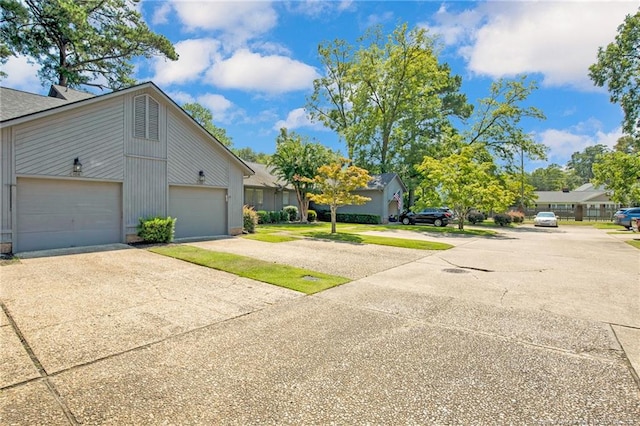 exterior space with a garage