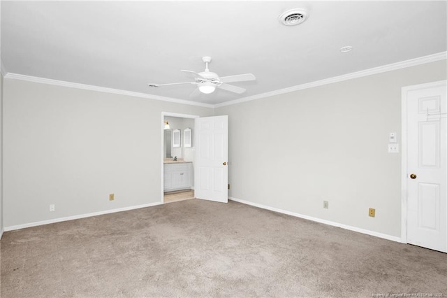 carpeted spare room with crown molding and ceiling fan