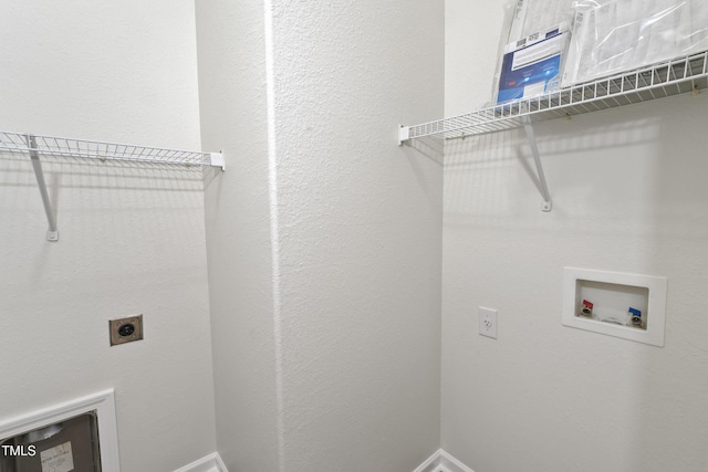 laundry room featuring hookup for a washing machine and hookup for an electric dryer