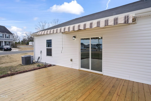 wooden deck with central air condition unit