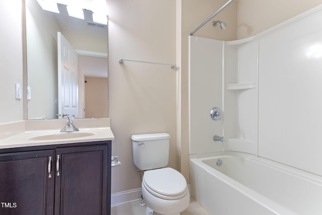 full bathroom featuring washtub / shower combination, vanity, and toilet