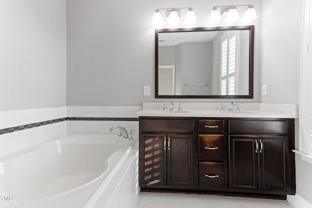 bathroom featuring vanity and a relaxing tiled tub