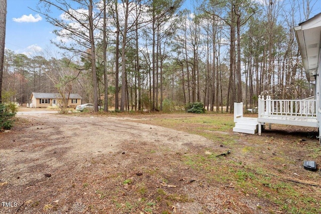 view of yard with a deck