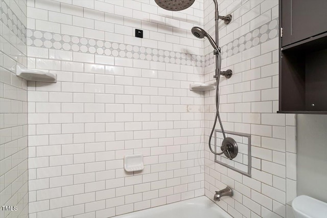 full bath featuring tub / shower combination and toilet