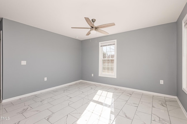 empty room featuring ceiling fan