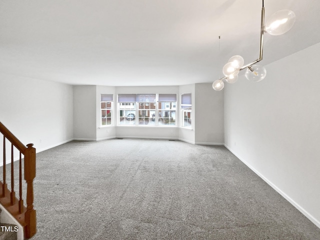 unfurnished living room with carpet floors