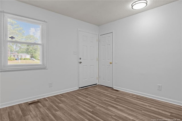 1433 Carnsmore Dr, Fayetteville, NC 28304 - unfurnished room featuring wood finished floors and baseboards