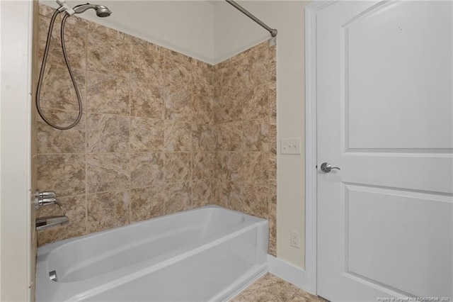 bathroom featuring shower / tub combination and tile patterned floors