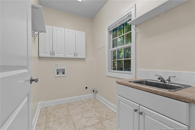 laundry room with sink, cabinets, washer hookup, light tile patterned floors, and hookup for an electric dryer