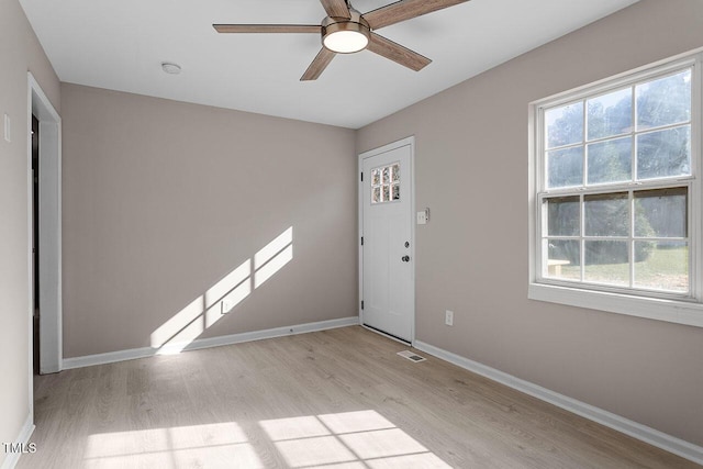 interior space with ceiling fan and light wood-type flooring