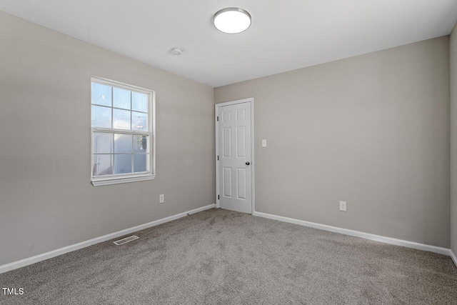 view of carpeted spare room