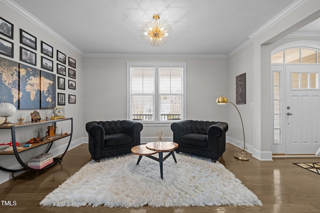 living room with a notable chandelier, crown molding, and dark hardwood / wood-style floors