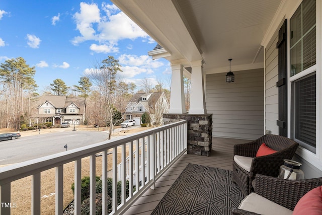 balcony featuring a porch