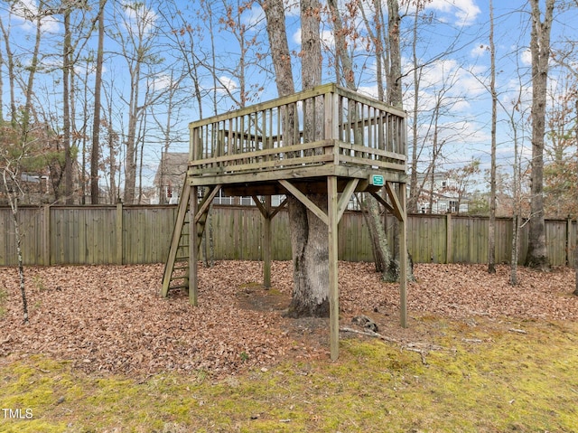 view of yard with a wooden deck