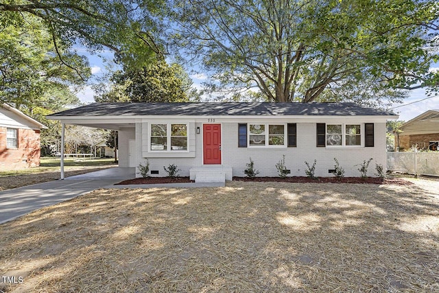 view of front of home featuring a carport