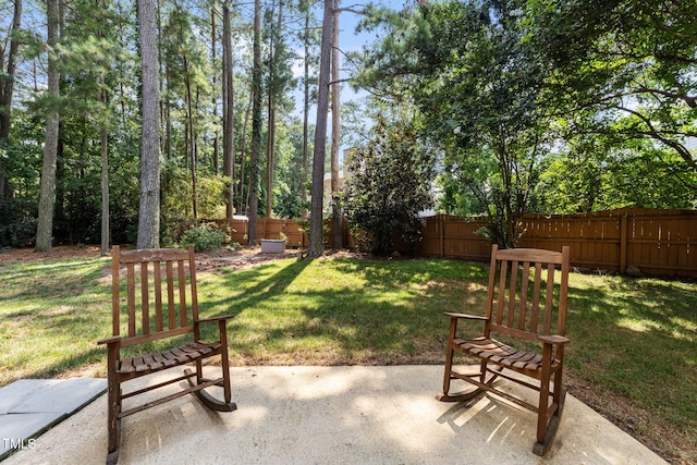 8005 Chatahoochie Ln, Raleigh, NC 27616 - fenced backyard featuring a patio
