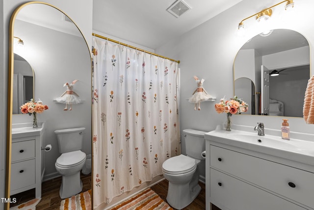 8005 Chatahoochie Ln, Raleigh, NC 27616 - full bathroom with vanity, wood finished floors, ceiling fan, and a shower with curtain