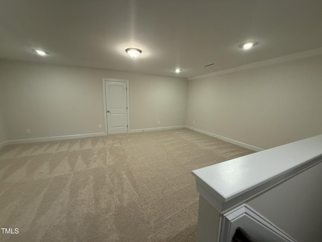 basement featuring carpet flooring