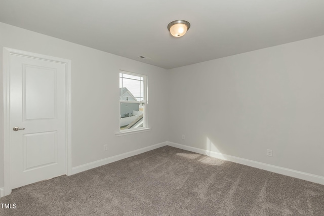 view of carpeted spare room