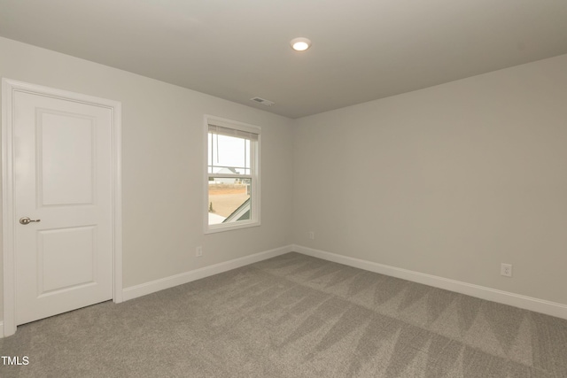 view of carpeted spare room