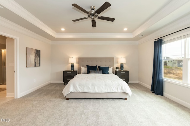 carpeted bedroom with crown molding, a raised ceiling, and ceiling fan