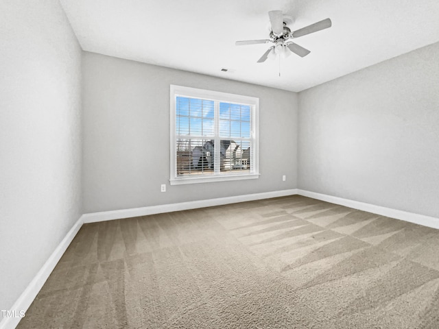 unfurnished room with carpet floors and ceiling fan