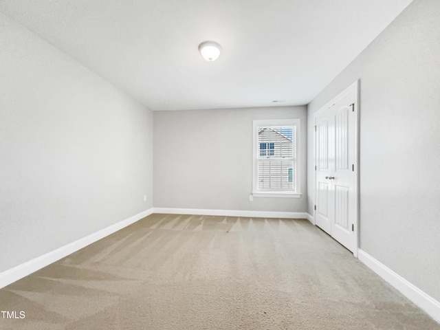 empty room with carpet floors