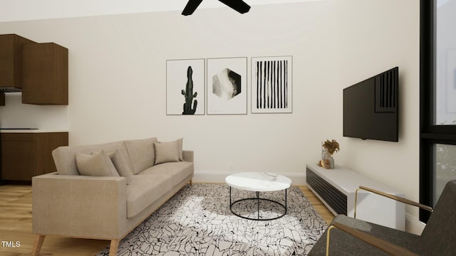 living room featuring light hardwood / wood-style floors and ceiling fan