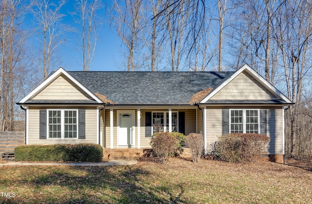 single story home with a front yard