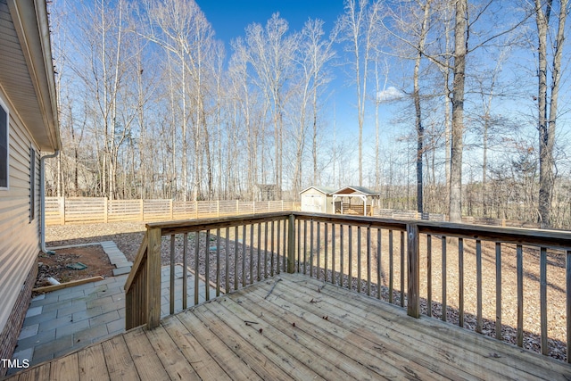 deck featuring a storage shed