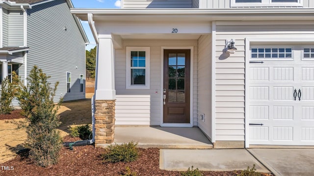 entrance to property with a porch