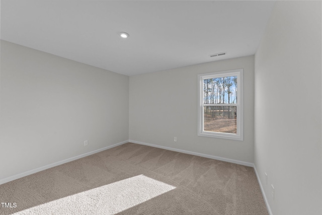 view of carpeted spare room