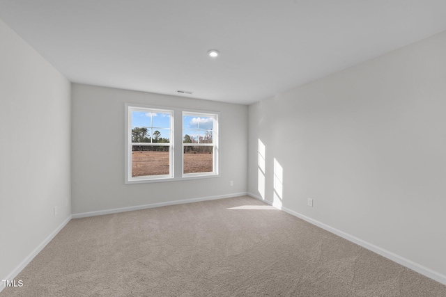 view of carpeted spare room